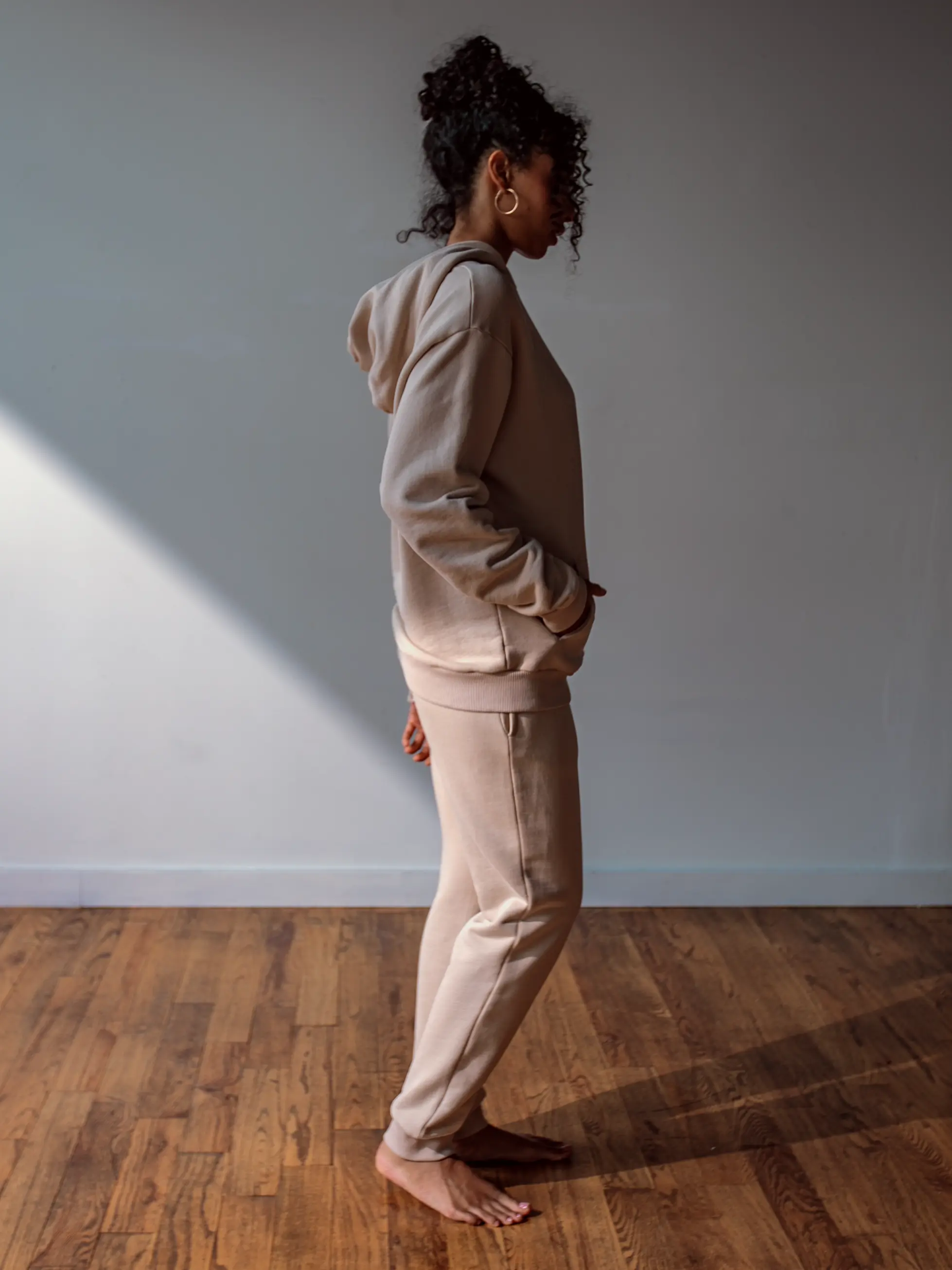 Close-up of a single green leaf against a white background.